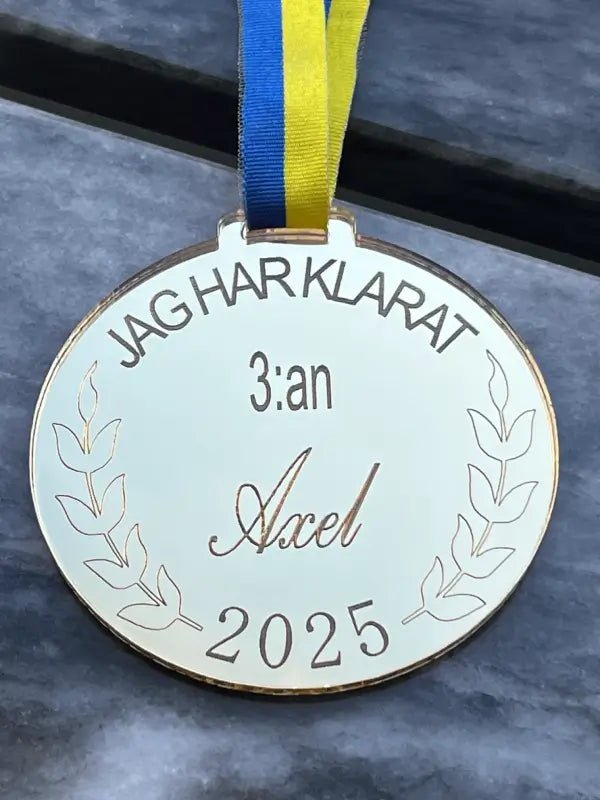Medalj | 3:an - DinMedalj
