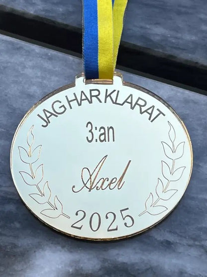 Medalj | 3:an - DinMedalj